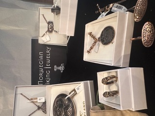 Norwegian Viking souvenir mugs with Thor's hammer Mjolnir and runic inscriptions – authentic gifts from Olden, Norway